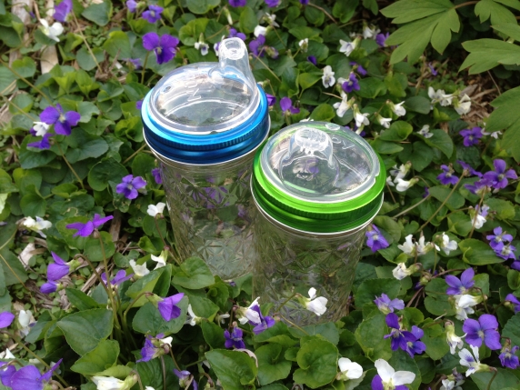 Nuby silicone sippy cup lid with metal ring, jar not included.